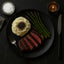 Steak dinner with asparagus and mashed potatoes seasoned with Imperia Truffle Salt featuring Italian truffle and black summer truffle notes