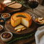 Artisan Belgian Charmoix Raw Cow Cheese Wheel with Rosemary for Gourmet Cuisine
