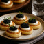Gourmet food house Blini featuring caviar-topped blinis for an exquisite caviar recipe read