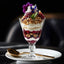 Layered parfait with granola berries yogurt edible flowers showcasing Polenghi Mascarpone creamy Italian flavor