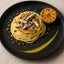 Spaghetti with sardines and grilled lemon showcasing Matiz Sardines flavor profile