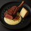 Gourmet lamb chop with mashed potatoes and Petit Basque Cheese from French Pyrenees