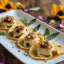 Gourmet ravioli dish featuring Sheep Cheese with Black Garlic 3KG and black garlic
