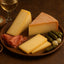 Swiss Raclette Cheese cheese platter with accompaniments, perfect melting cheese for gatherings