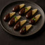 Chocolate-dipped candied citrus slices paired with TCHO Sweet and Sassy Chocolate Bar